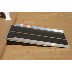WALK RAMP, WHEELCHAIR RAMP, 4 IN SERVICE HT - MIN - NEW, NON-SKID, 1 1/2 IN SIDE RAIL HT - NEW by Prairie View Industries Inc.