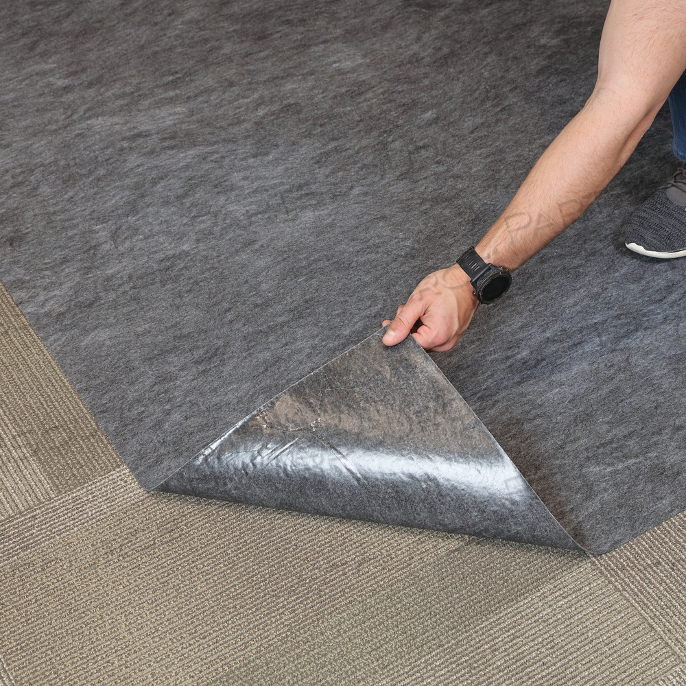 PIG CARPET PROTECTION ULTRA-DUTY ADHESIVE-BACKED GRIPPY FLOOR MAT by New Pig Corporation PIG CARPET PROTECTION ULTRA-DUTY ADHESIVE-BACKED GRIPPY FLOOR MAT by New Pig Corporation