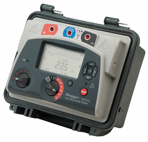 AC AND BATTERY MEGOHMMETER 5000VDC by Megger